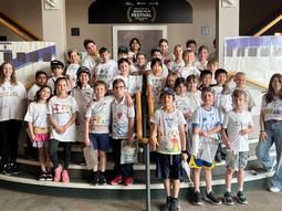 Gray Academy Wins National Library of Israel Poster Competition and Anu Museum (First Place Family Story) Competition