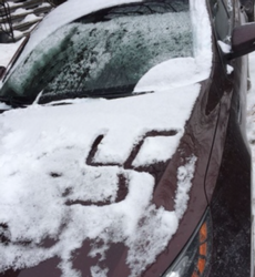 A swastika drawn on a car in Montreal (Photo Credit: Facebook/Mayer Feig)