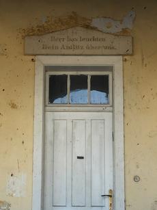 The German under this door frame reads: " Let your face shine on us."