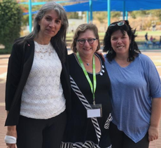 Elaine Goldstine (centre) with staff at Ramat korazim school