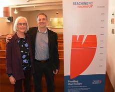 Temple President Linda Freed and lead donor Alecs Chochinov celebrate his family's gift of $100,000