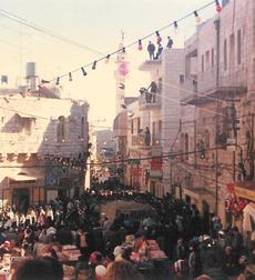 Christmas day in Bethlehem with Israeli soldiers on the rooftops