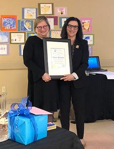 Elaine Goldstine receiving recognition for her 25 years of service from Laurel Malkin, President of Jewish Federation of Winnipeg