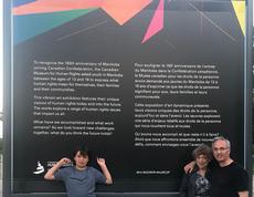 R to L: Larry and Tova Vickar with their grandson Vaughn at the ARTiculate Our Rights Exhibit