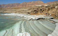 Patterns emerge from beneath the water of the Dead Sea as the water recedes.