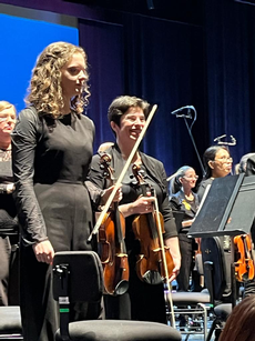 Sonya Lazar (dark hair) playing one of the Violins of Hope at the Winnipeg Symphony Orchestra’s “Violins of Hope” concert held on Saturday, December 3, 2022