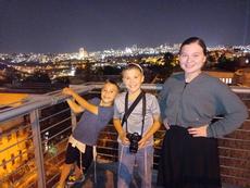 Gavriel Lakser's children with the Jerusalem skyline in the background