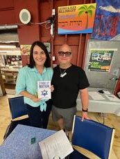 Aviva Klompas with David Greaves in the dining hall at Camp Massad