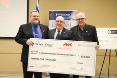 L-R: John Plantz, Ariel Karabelnicoff, and Robert Gottselig with the cheque for $25,000